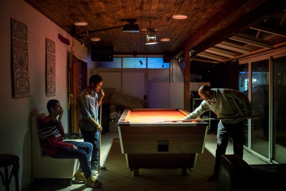 Pool hall boys. Mohammed Abdinasir Salen (at left), Shakir Adan Mohammed and Mowlid Mohammed