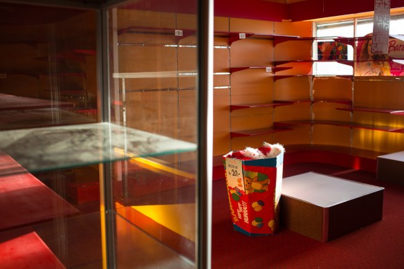 Kala #6. The toy store cleaned out. Only a basket of christmas hats remain